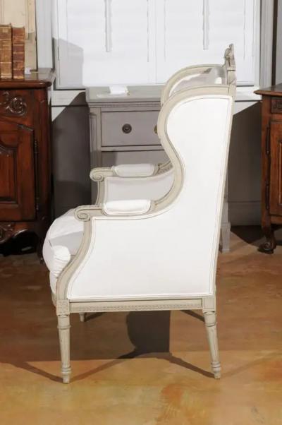 French Louis XVI Style 19th Century Painted and Carved Wingback Berg re Chair