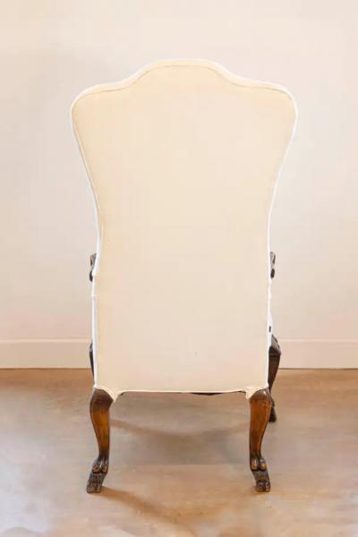French Louis XVI Style 19th Century Painted and Carved Wingback Berg re Chair