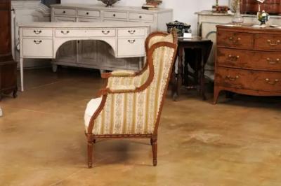 French Louis XVI Style 19th Century Walnut Berg re Oreilles with Carved Roses
