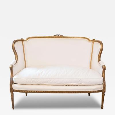 French Louis XVI Style Wingback Settee with Original Gilding and New Fabric