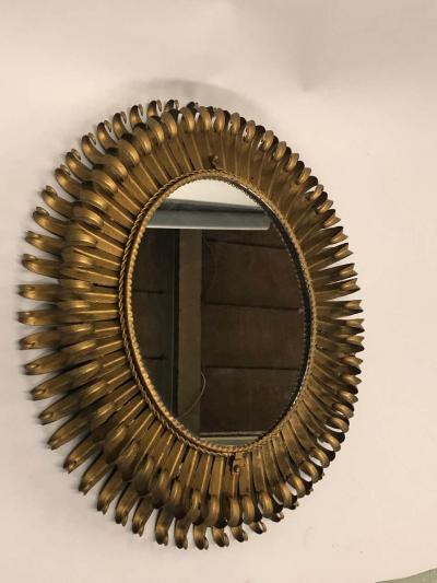 French Midcentury Oval Gilt Iron Sunburst or Wall Mirror