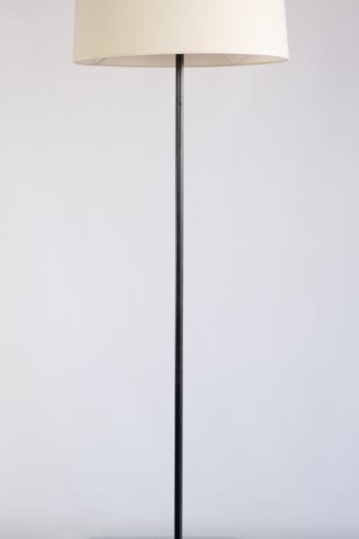 French Modern Three Legged Floor Lamp Black Iron and Ivory Shade 1950s