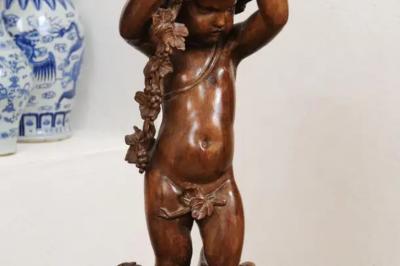 French Napol on III 1860s Carved Walnut Sculpture of a Putto Carrying a Vessel