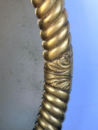 French Napoleon III carved giltwood rope twist oval mirror