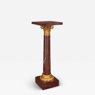 French Neoclassical gilt bronze and rouge griotte marble pedestal