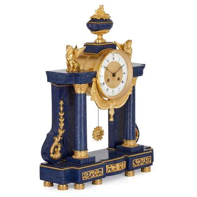French Neoclassical style lapis and gilt bronze clock set