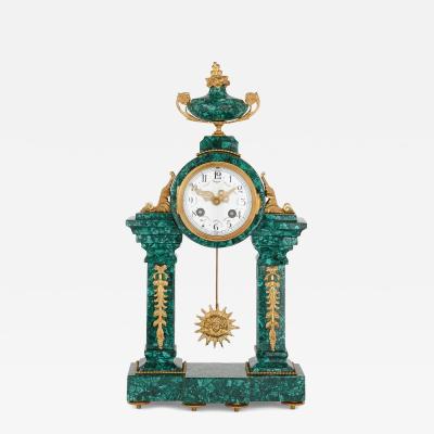 French Neoclassical style malachite and gilt bronze mantel clock