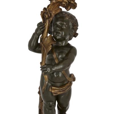 French Patinated Bronze Lamp Modelled as a Putto
