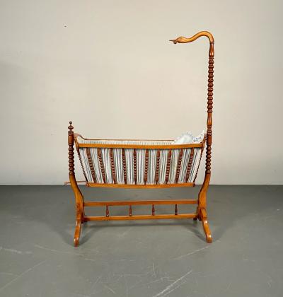French Spindled 19th Century Walnut Decorative Cradle Swan Motif