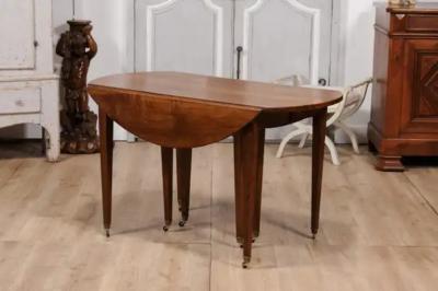 French Turn of the Century Extension Walnut Table With Five Leaves Circa 1900