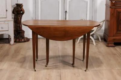 French Turn of the Century Extension Walnut Table With Five Leaves Circa 1900