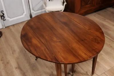 French Turn of the Century Extension Walnut Table With Five Leaves Circa 1900
