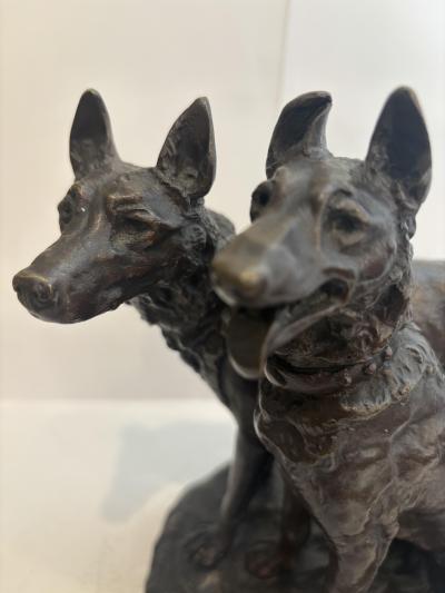 French bronze group of two dogs with one sitting signed Laplanche 