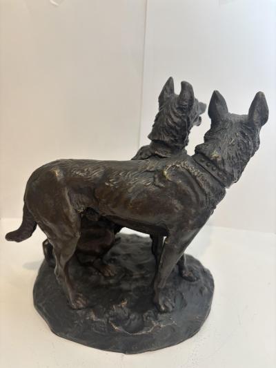 French bronze group of two dogs with one sitting signed Laplanche 