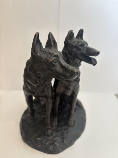 French bronze group of two dogs with one sitting signed Laplanche 