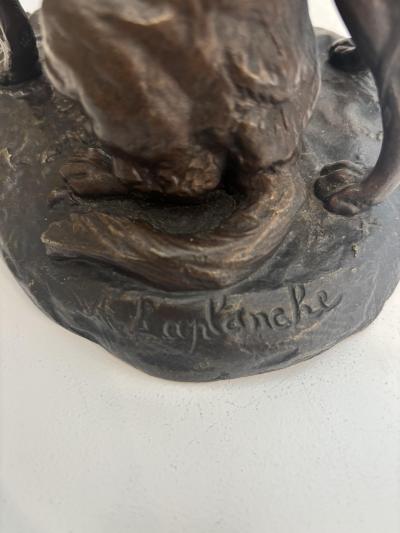 French bronze group of two dogs with one sitting signed Laplanche 