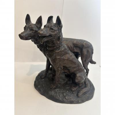 French bronze group of two dogs with one sitting signed Laplanche 