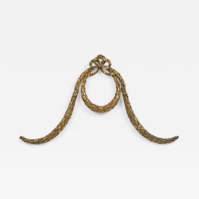 French bronze wall mounted ornament of a wreath with bow knot top