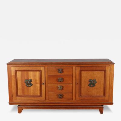 French oak sideboard circa 1940 having two doors and four drawers