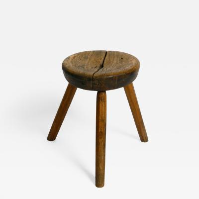 French three legged Mid Century solid wood stool with a dreamlike patina