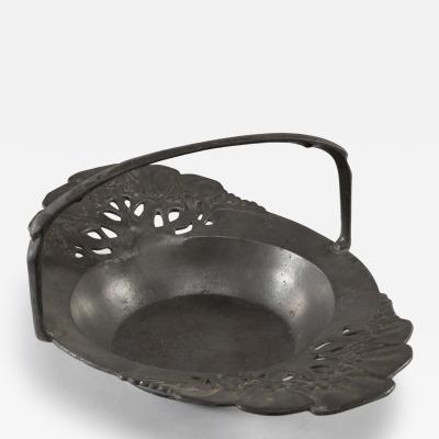 Friedrich Adler Urania An Art Nouveau Pewter Fruit Bowl with a Loop Handle Floral Decoration