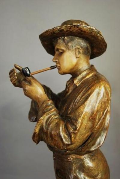 Friedrich Goldscheider Early 20thc bronzed slip cast figure of a gaucho by Goldscheider