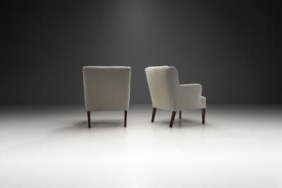 Frits Henningsen Frits Henningsen Easy Chairs with Fluted Legs Denmark 1940s