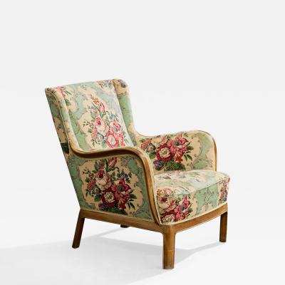 Frits Henningsen Lounge Chair with Wood and Fabric Denmark 1940s