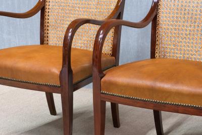 Frits Henningsen Pair of Frits Henningsen Armchairs in Mahogany Cane and Leather Denmark 1931
