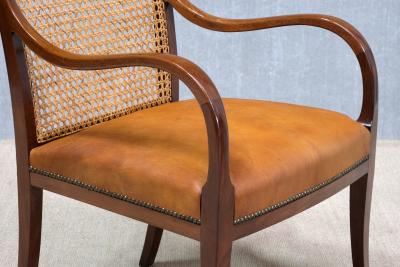 Frits Henningsen Pair of Frits Henningsen Armchairs in Mahogany Cane and Leather Denmark 1931