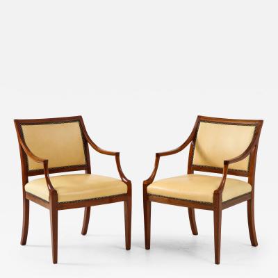 Frits Henningsen Pair of Frits Henningsen Mahogany and Leather Open Armchair circa 1940s