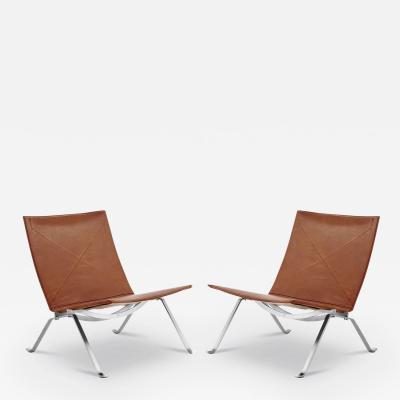 Fritz Hansen PAIR OF POUL KJAERHOLM PK22 LOUNGE CHAIR IN RUSTIC LEATHER