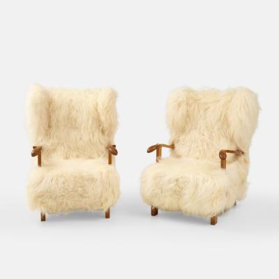 Fritz Hansen Rare Pair of Wingback Lounge Chairs Model 1582 in Sheepskin by Fritz Hansen