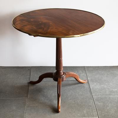 GEORGE III FLAME MAHOGANY TILT TOP TRIPOD TABLE Circa 1790