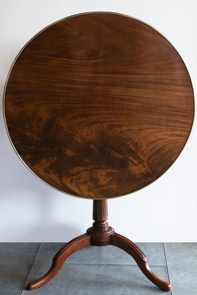 GEORGE III FLAME MAHOGANY TILT TOP TRIPOD TABLE Circa 1790