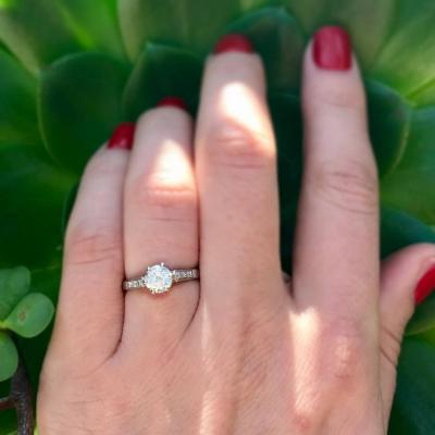 GIA CERTIFIED 0 73 CARAT ROUND BRILLIANT CUT DIAMOND AND PLATINUM VINTAGE RING