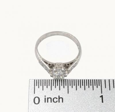 GIA CERTIFIED 0 73 CARAT ROUND BRILLIANT CUT DIAMOND AND PLATINUM VINTAGE RING