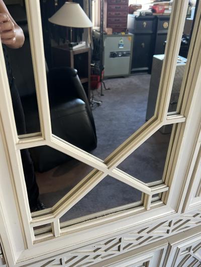 GLAMOROUS PAIR OF HOLLYWOOD REGENCY PAGODA FORM MIRRORED WALL CABINETS