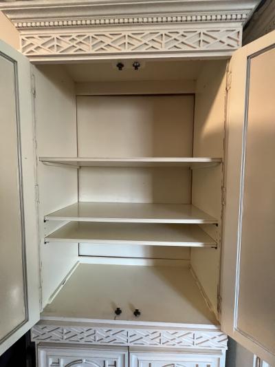 GLAMOROUS PAIR OF HOLLYWOOD REGENCY PAGODA FORM MIRRORED WALL CABINETS