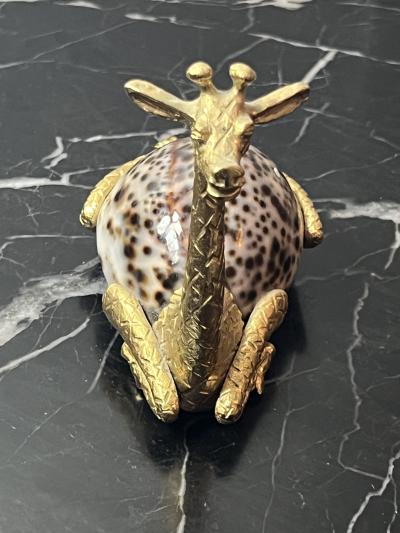 GOLD METAL GIRAFFE WITH COWRIE SHELL BODY SCULPTURE