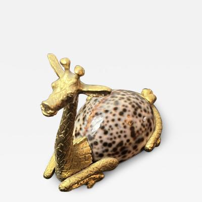 GOLD METAL GIRAFFE WITH COWRIE SHELL BODY SCULPTURE