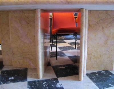 Gae Aulenti Sculptural table in clear Rosso marble by Gae Aulenti