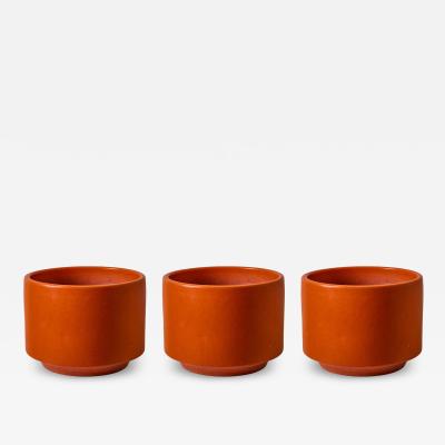 Gainey Ceramics Set of Three 1960s Gainey Orange Glazed Planters