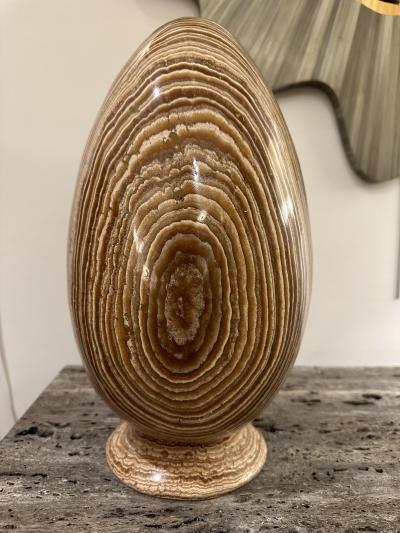 Genuine Aragonite Stone in the shape of an Egg with matching base 