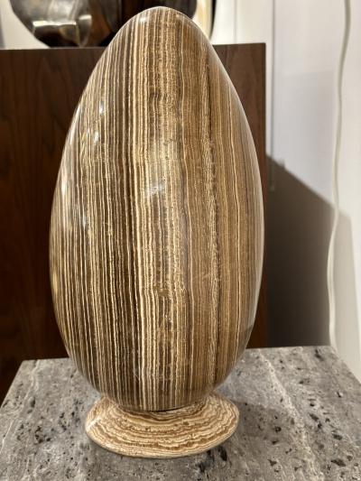 Genuine Aragonite Stone in the shape of an Egg with matching base 