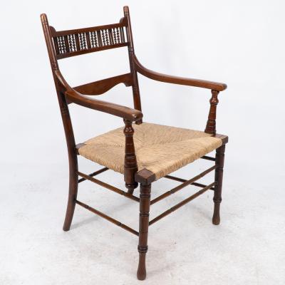 George Bell George Freeth Roper Aesthetic Movement Walnut rush seat armchair 