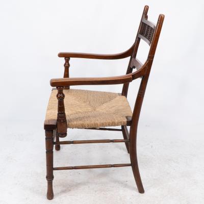 George Bell George Freeth Roper Aesthetic Movement Walnut rush seat armchair 