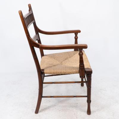 George Bell George Freeth Roper Aesthetic Movement Walnut rush seat armchair 