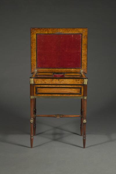 George Bullock A Regency gilt brass mounted burr oak ebony and brass marquetry center table