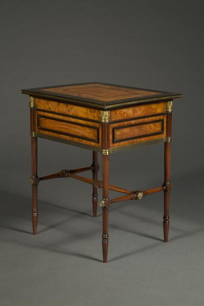 George Bullock A Regency gilt brass mounted burr oak ebony and brass marquetry center table